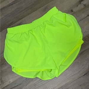 Neon like green running shorts
